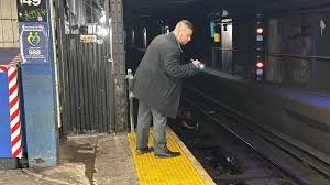 A 25-year-old man was repeatedly stabbed by an unknown assailant on a northbound 5 train in the Bronx. The victim is in critical but stable condition, and the suspect remains at large. This incident adds to concerns over transit violence in NYC.