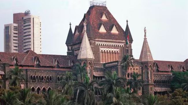 ALT="Bombay High Court building representing the burdened Indian judiciary"