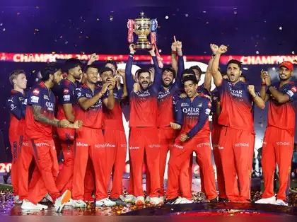 "Royal Challengers Bengaluru players with trophy, potential franchise sale ahead"