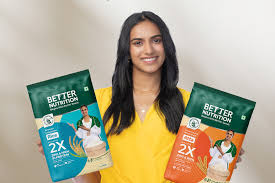 PV Sindhu promoting Better Nutrition products, with revenue growth chart and product range in background
