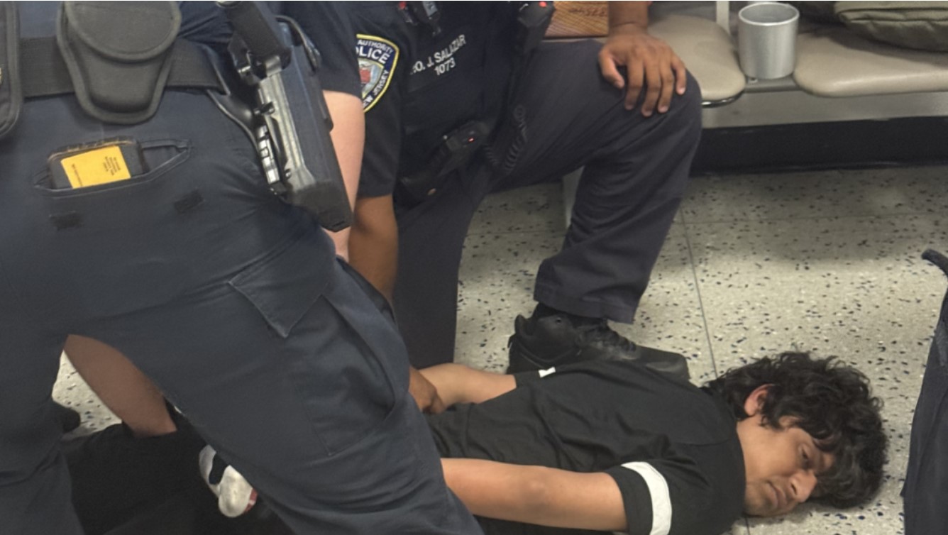"Indian student being detained by security officials at Newark Airport amid diplomatic concerns"