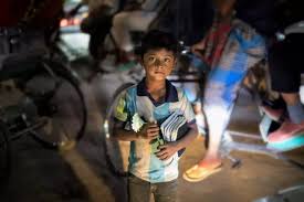 Indian children working in a brick kiln highlighting the issue of child labour in rural India