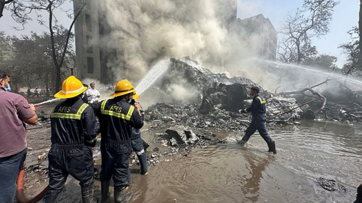 "Air India Flight AI-171 crash site in Ahmedabad with emergency responders"