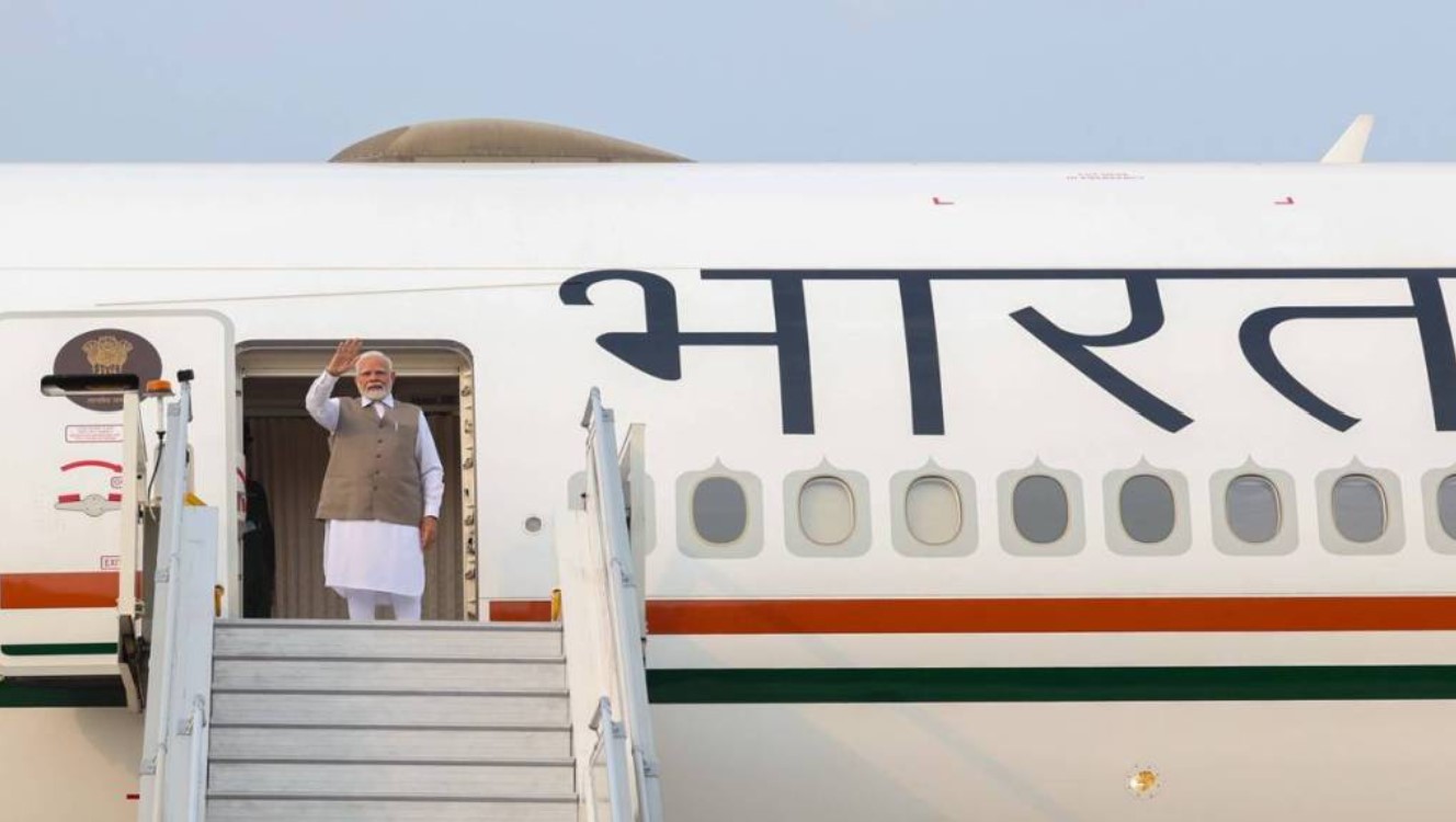 "Prime Minister Narendra Modi boarding an aircraft for official 3-nation diplomatic visit to Cyprus, Canada, and Croatia"