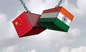 Indian and US flags with cargo containers in the background, symbolizing trade negotiations