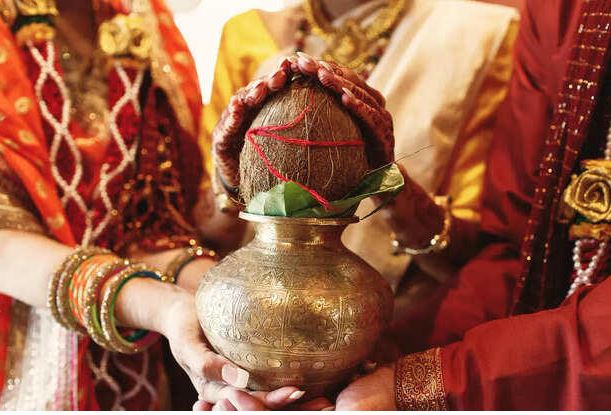 "Bhagavad Gita book placed near a diya symbolizing spiritual guidance on life decisions like marriage"
