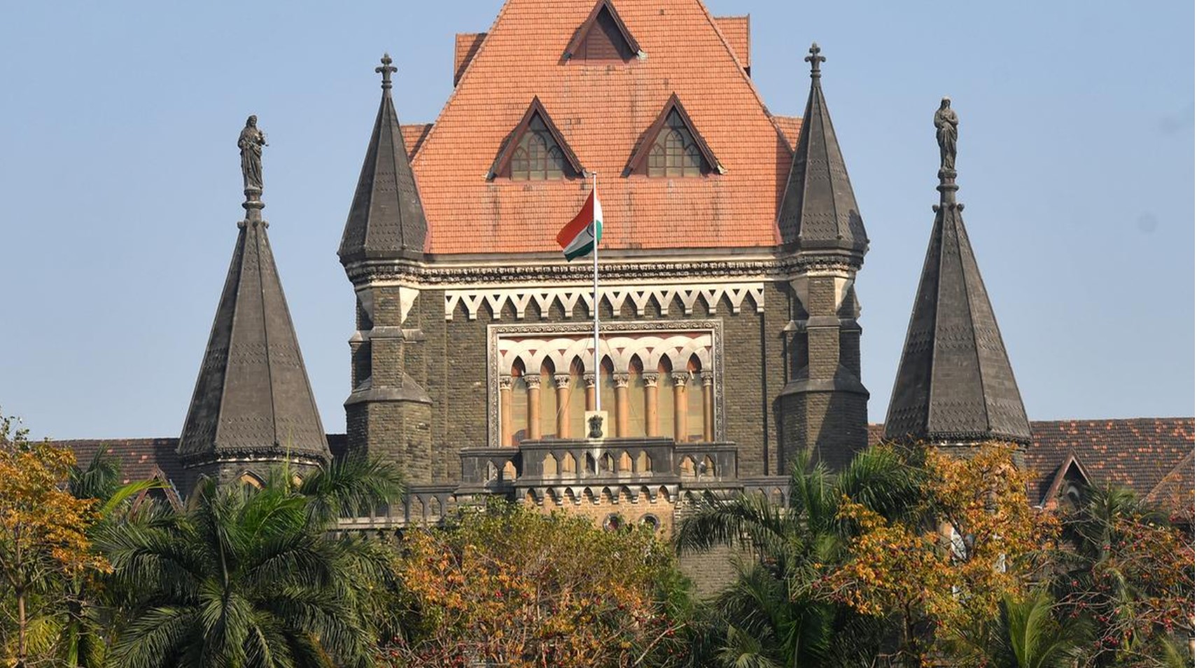 “Bombay High Court building with trademark law concept overlay representing Yamaha-Honda case”