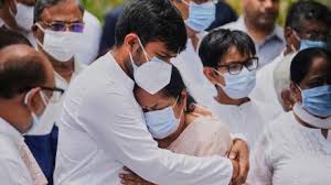 Damaged Air India aircraft on runway after crash, with emergency crews present