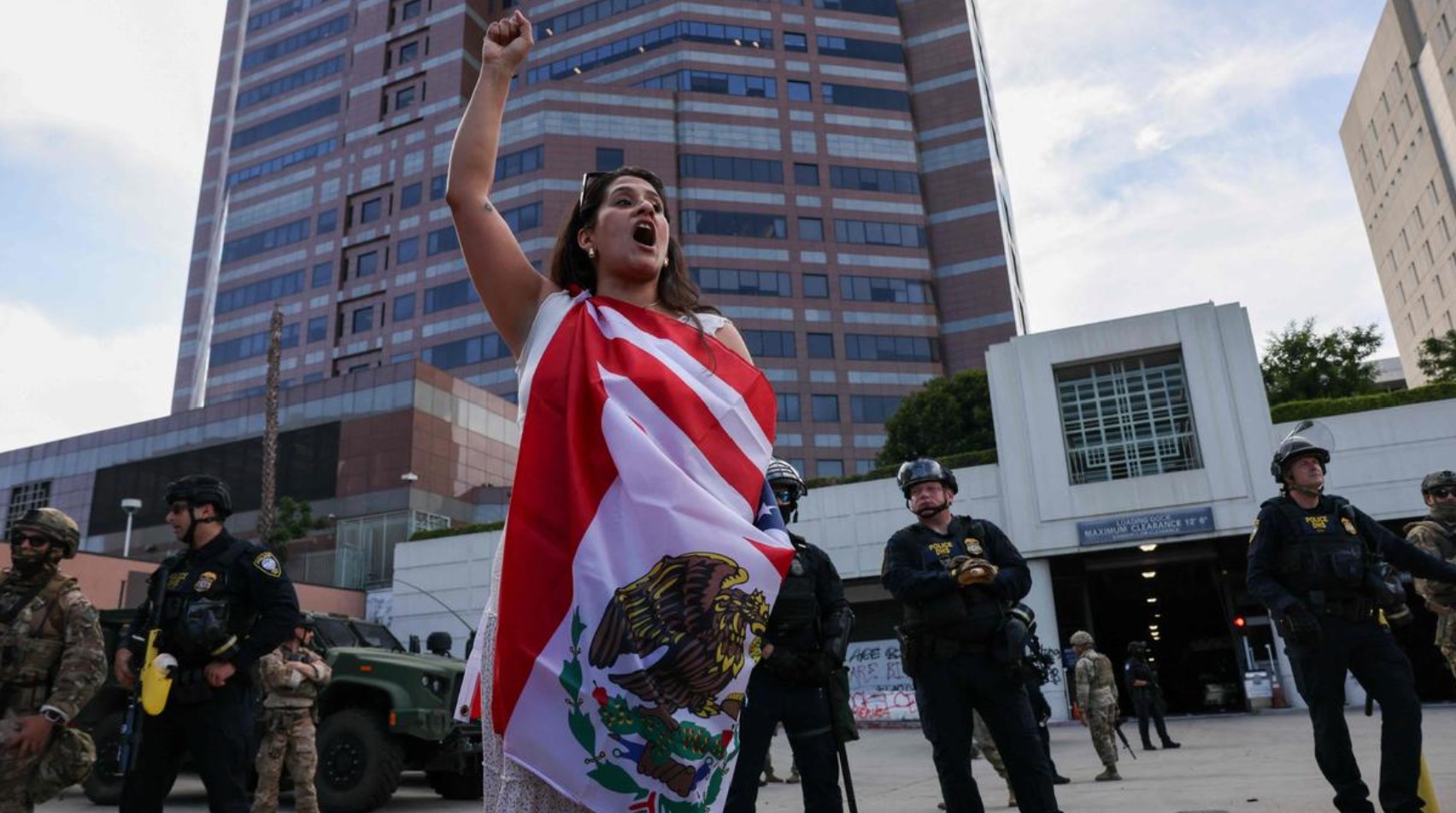 U.S. military personnel deployed in a domestic setting with American flag backdrop