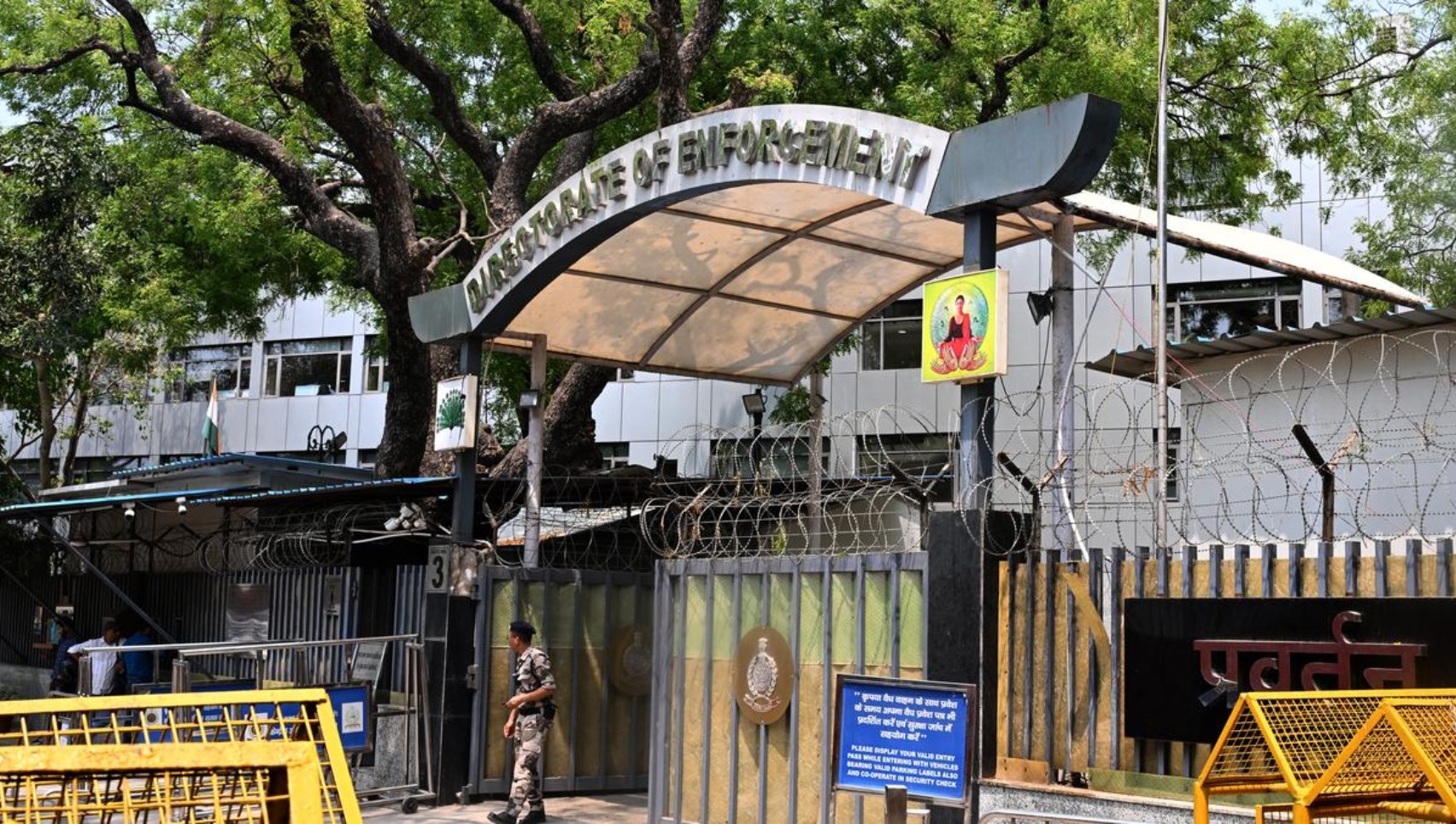 Madras High Court building in Chennai with a legal gavel in foreground
