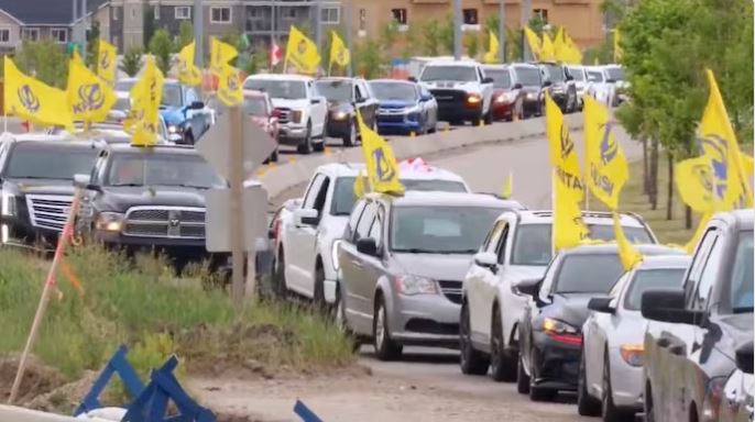 "Prime Minister Narendra Modi speaking at an international event during a foreign visit"