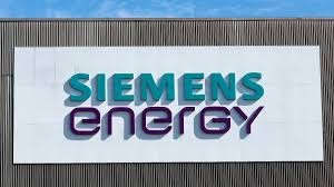 Siemens Energy stock chart showing strong debut with green upward arrows and 14% listing premium
