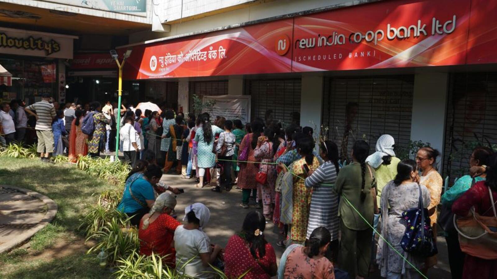 Mumbai EOW officers outside New India Co-op Bank branch after filing FIR in ₹25 crore loan fraud case involving Percept Group officials