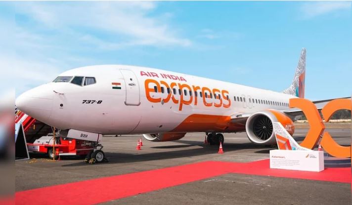 "Security personnel escorting passenger off plane after mid-air threat on Bengaluru-Delhi flight"