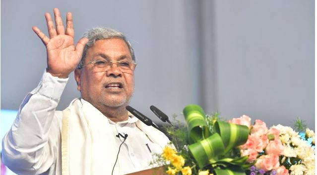 "Karnataka CM Siddaramaiah and Cabinet ministers during announcement of housing quota hike for minorities"