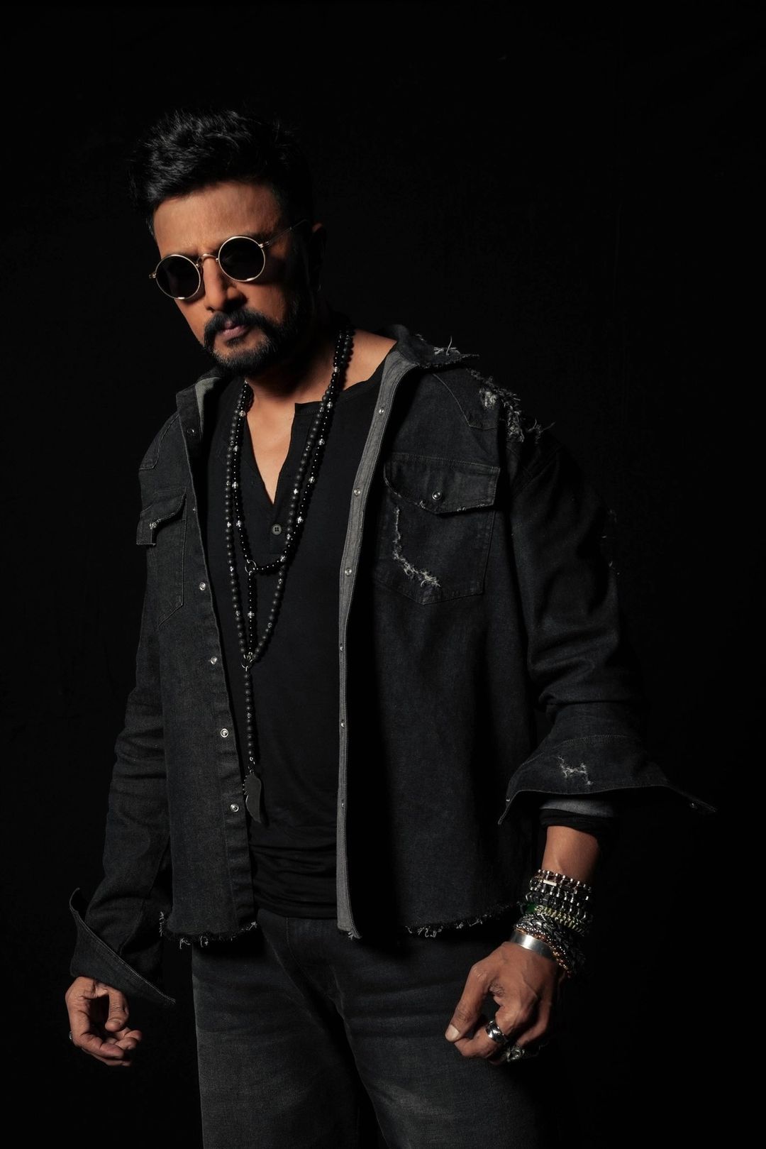 Sudeep addressing media about his Bigg Boss Kannada exit with a serious expression