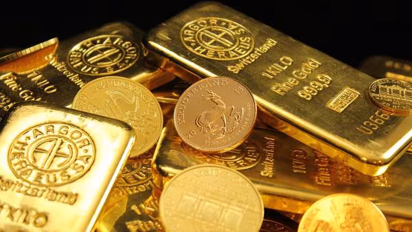 Gold coins on one side, digital gold app interface on the other showing price trends