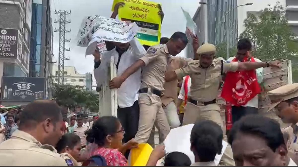 “Police detaining protesters outside the U.S. Consulate in Hyderabad during June 2025 demonstration”