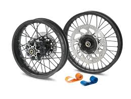 Alloy wheel and spoke wheel side-by-side comparison on adventure bikes