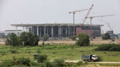 Construction near farmland for Jewar Airport development