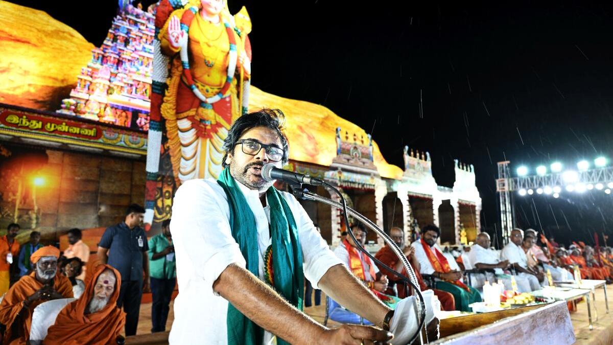Pawan Kalyan addressing a large crowd at the Murugan devotees’ conference in Madurai, emphasizing Hindu unity.