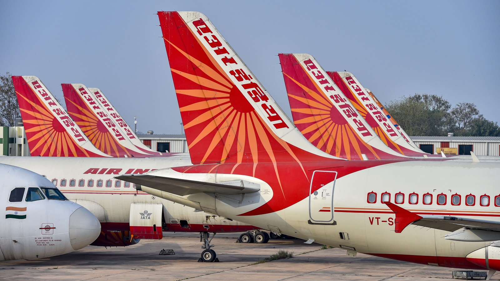 Air India aircraft parked at airport during international route reduction
