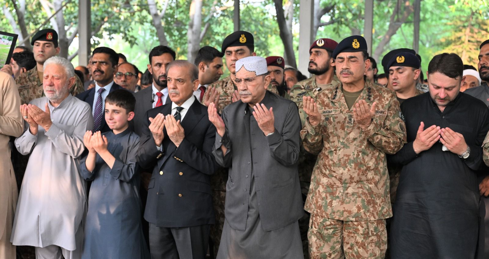 Pakistan Army Chief Asim Munir saluting at funeral