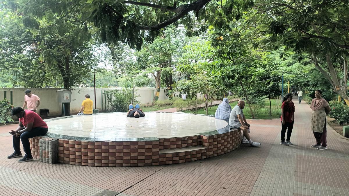 Walking path surrounded by trees inside Mayor Sundar Rao Park in Egmore, Chennai