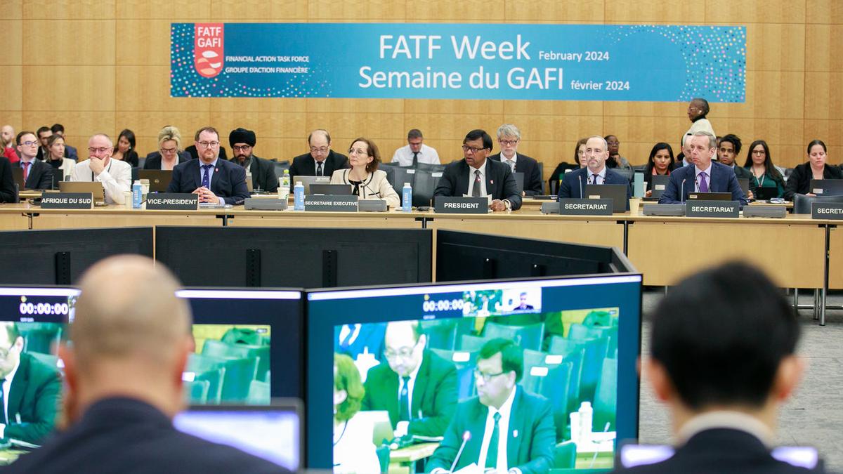 Illustration showing India and Pakistan flags with FATF logo and grey list implications