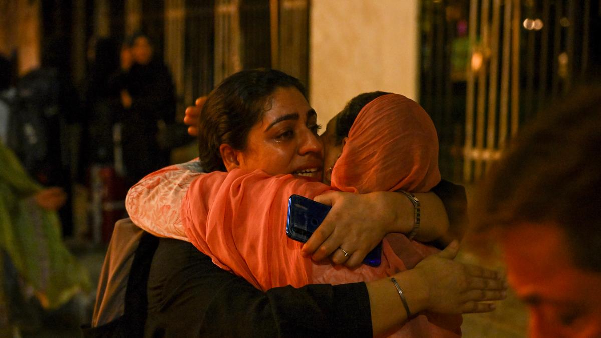 Displaced families fleeing their homes amid Operation Sindhu in a tense environment.