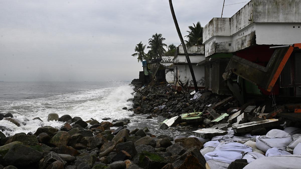 “Flooded homes and damaged coast in Chellanam village due to sea erosion in Kerala”