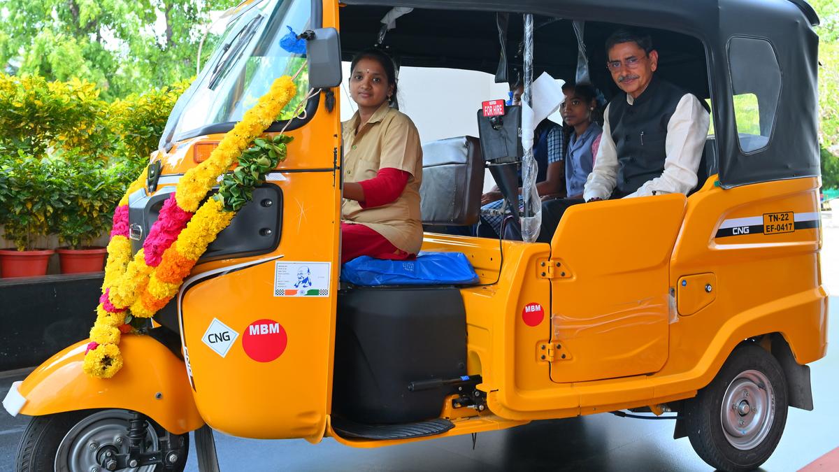 “Governor R.N. Ravi handing over keys of an autorickshaw to a woman driver”