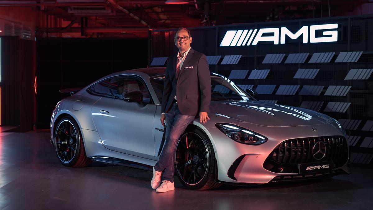 “Mercedes-Benz AMG GT 63 sports car showcased in metallic finish highlighting its sleek design and performance features”