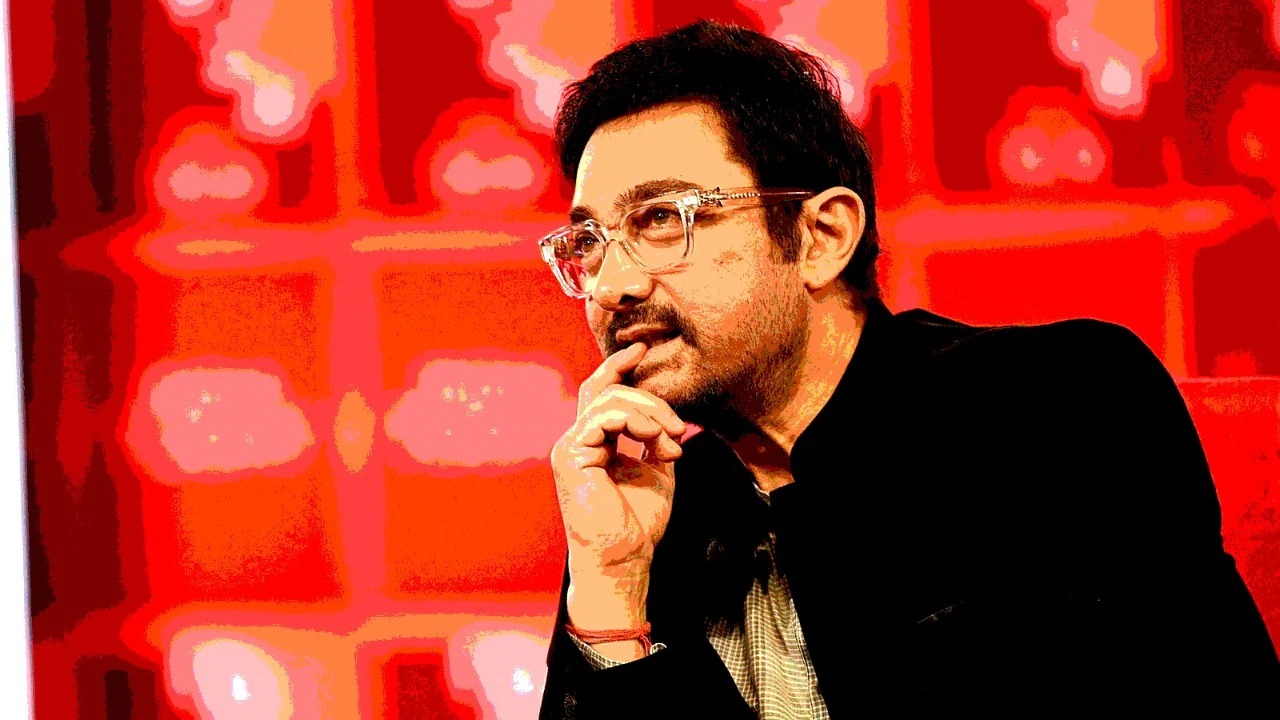 Bollywood actor Aamir Khan at a press event revealing past underworld invite