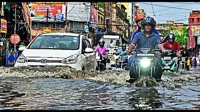 Commuters stranded at Kolkata metro station due to rain-induced delays and waterlogging.