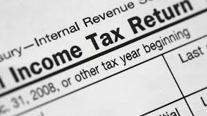 ITR e-filing portal open on laptop showing deduction section in ITR-1 form