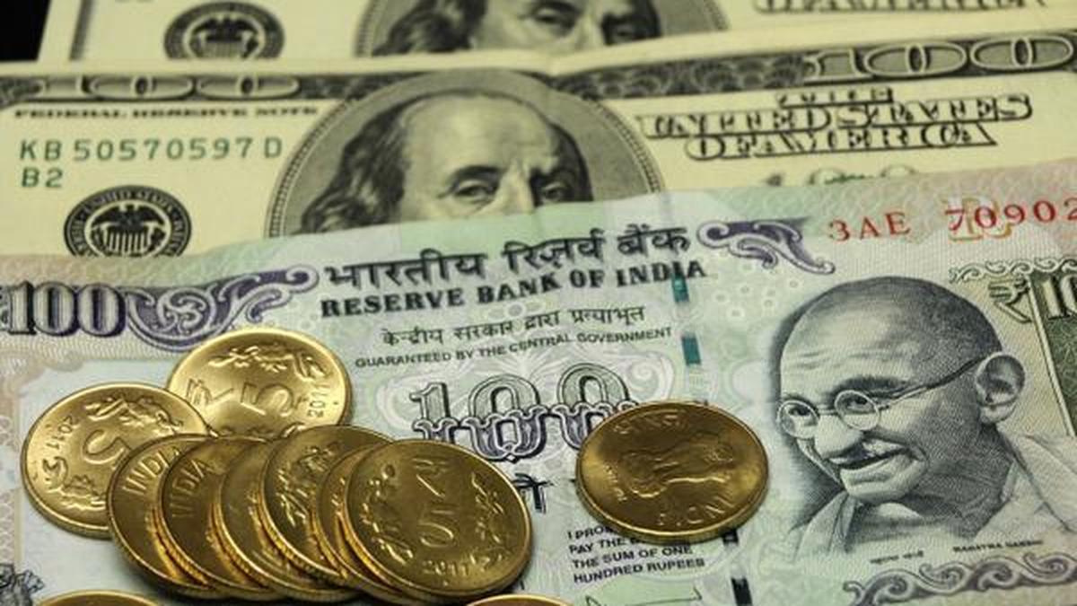 Indian rupee notes and dollar, stock chart showing rupee appreciation – Vizze Finance insight"