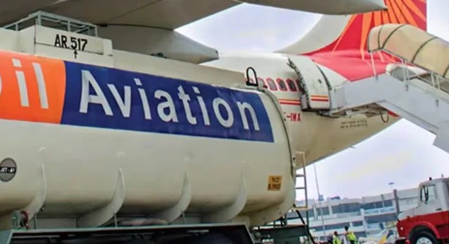 Jet refueling at airport with LPG cylinders in the background symbolizing fuel price changes in July 2025