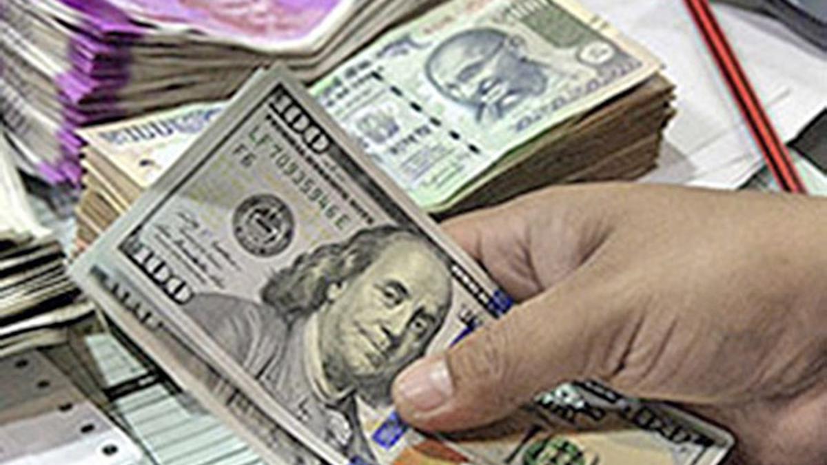 Indian Rupee symbol rising against US Dollar in forex market trading graph