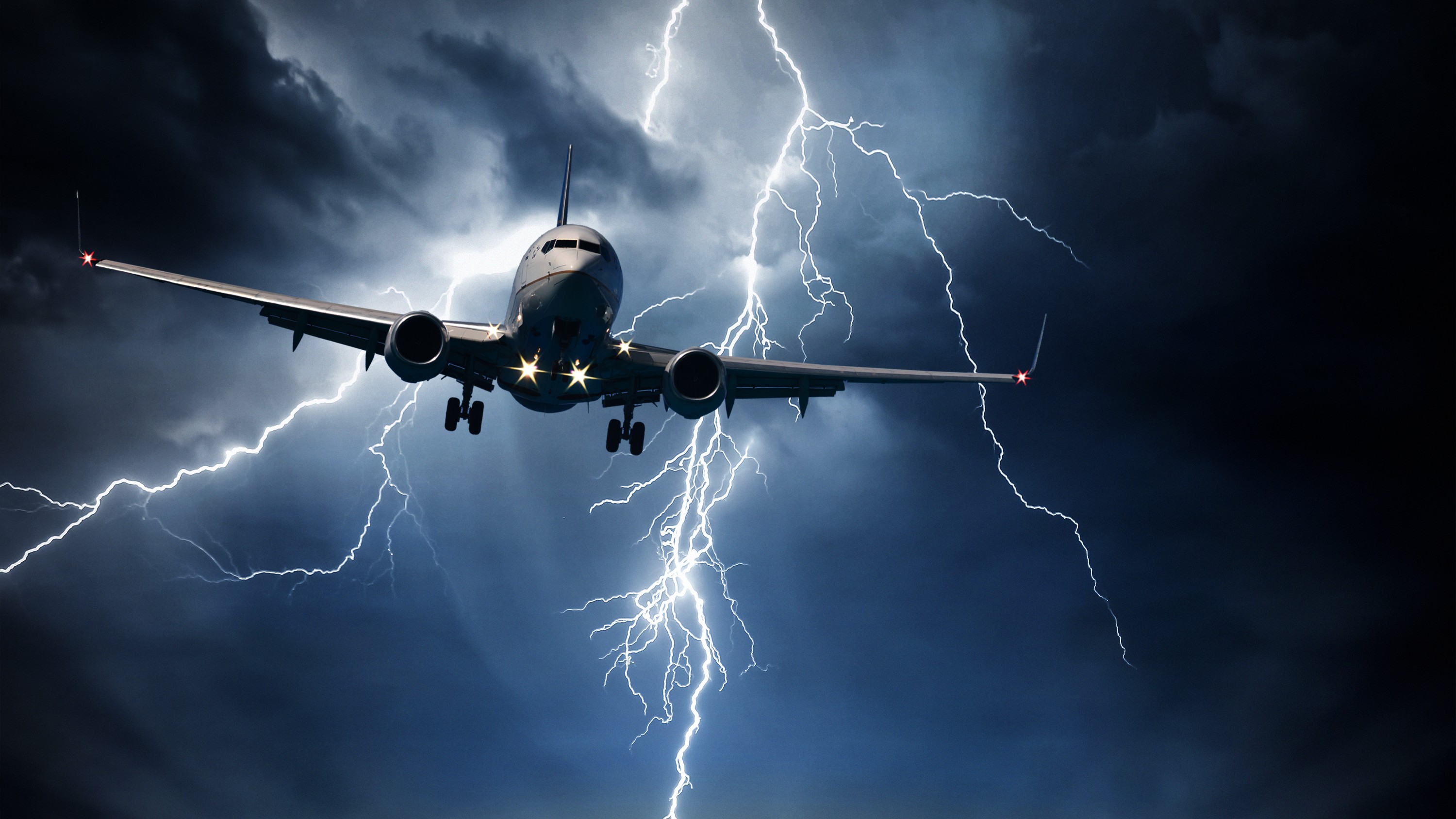Air India aircraft mid-flight during turbulence with storm clouds in background