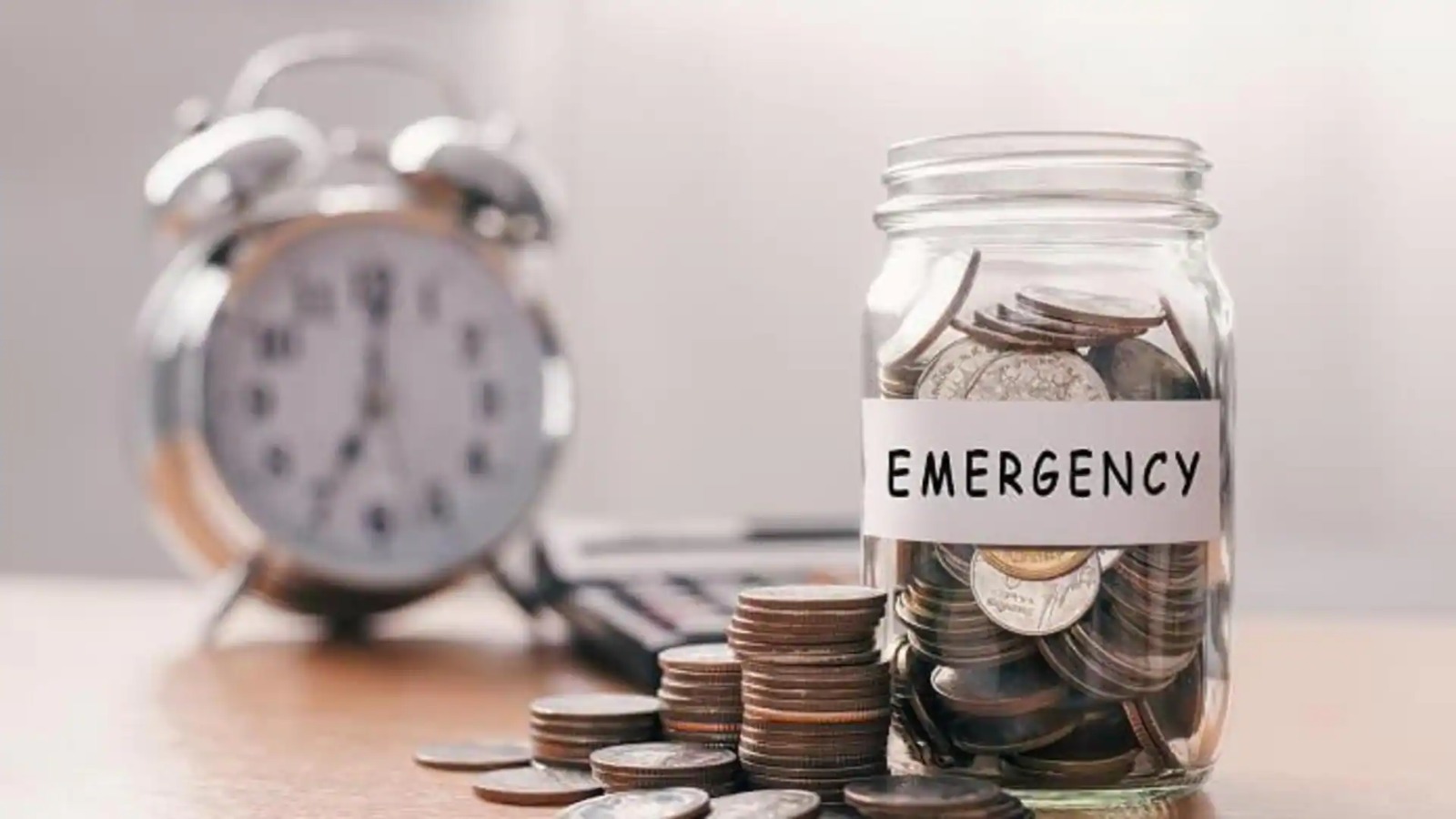 Emergency fund jar with ₹1,000 saved for financial safety