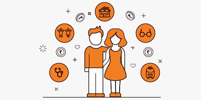 Newlywed couple discussing financial plans together on a laptop with a Vizzve loan brochure beside them.