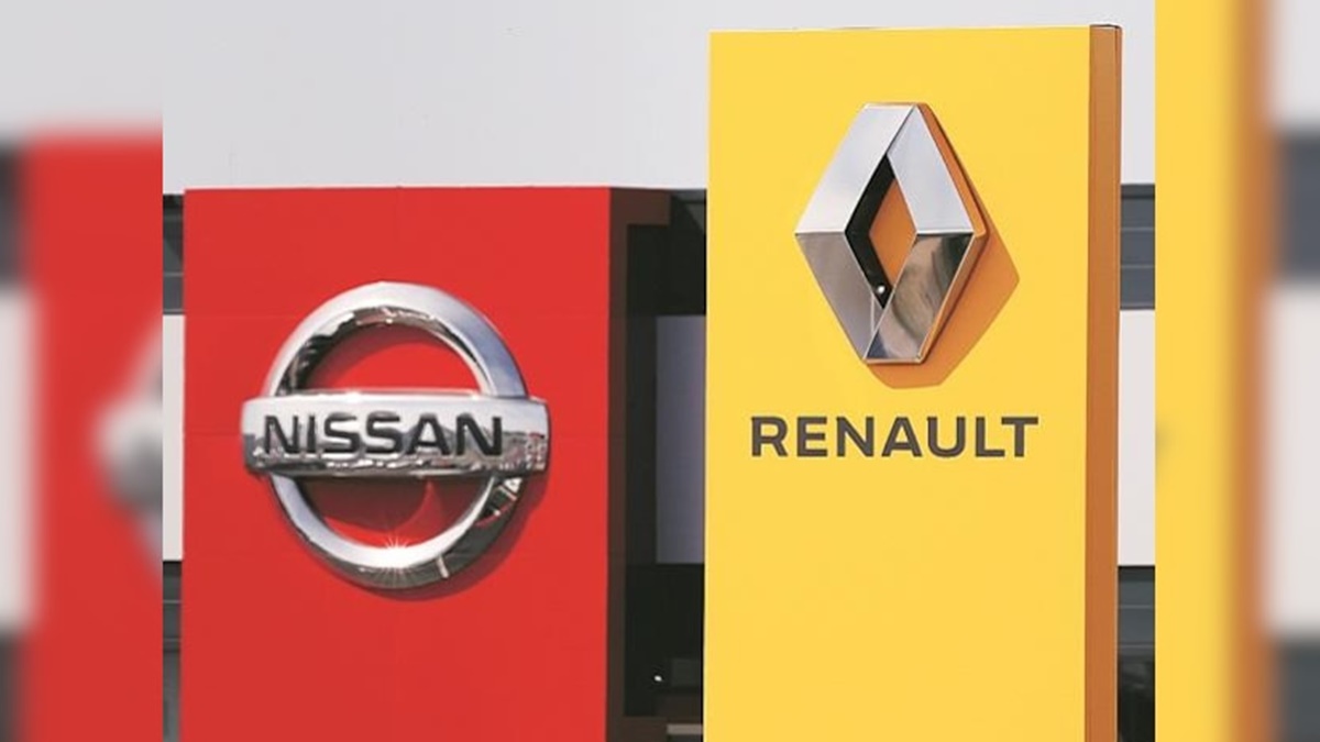 Renault and Nissan logos with a backdrop of financial graphs indicating a loss