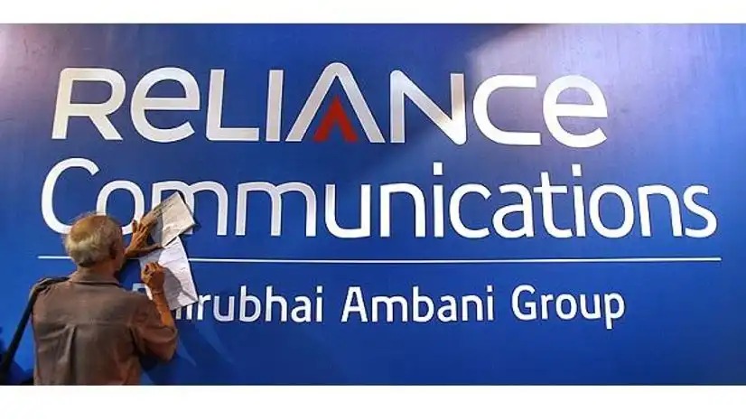 SBI building with Reliance Communication logo and Anil Ambani in frame