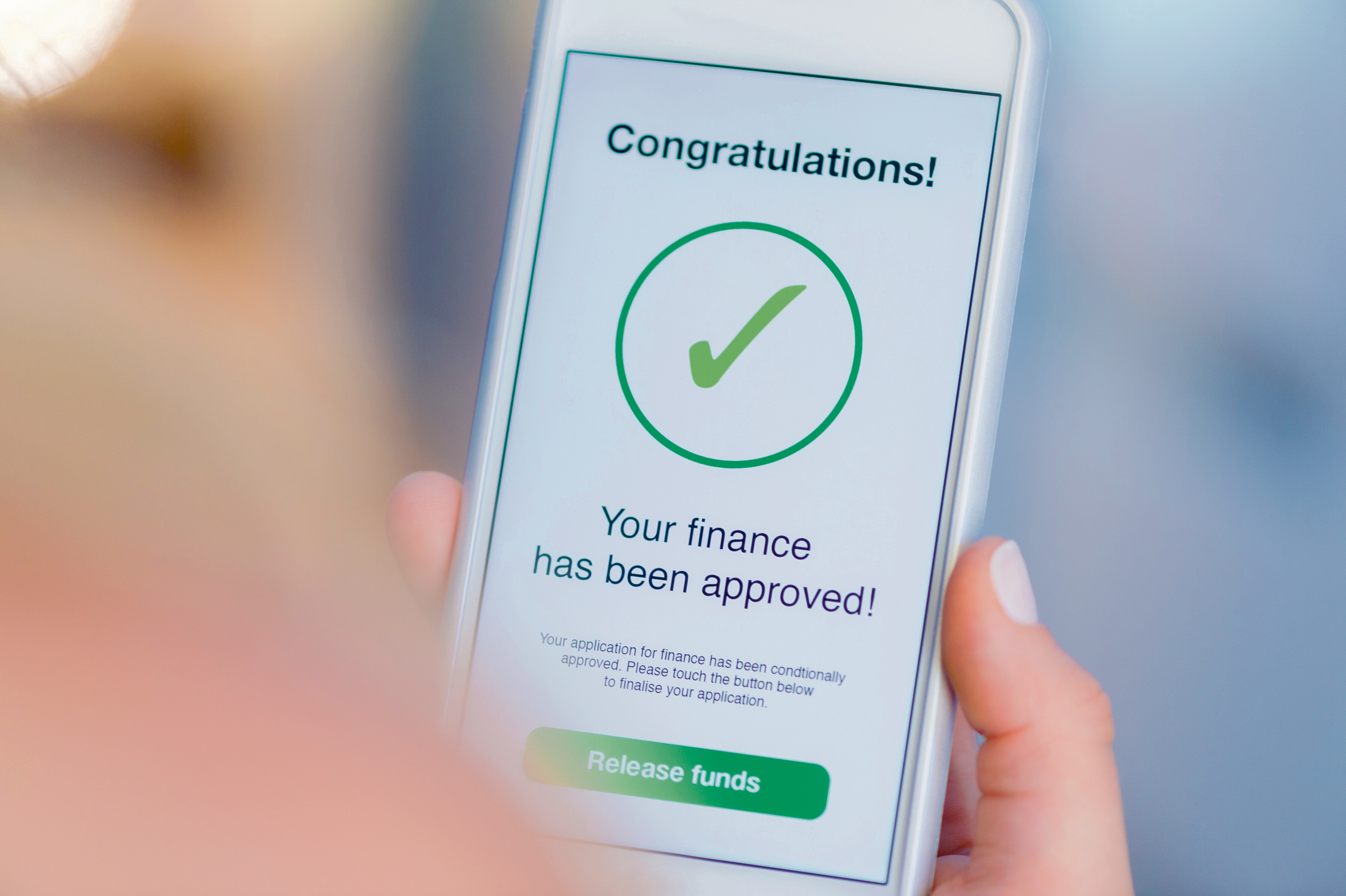 A person holding LIC documents and calculator, reviewing loan options with Vizzve Finance app open on phone