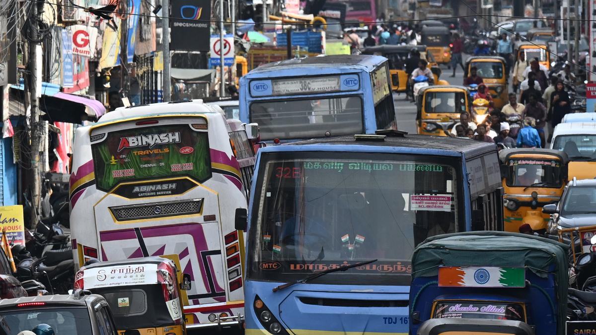 "Traffic congestion and potholes on Triplicane High Road, Chennai"