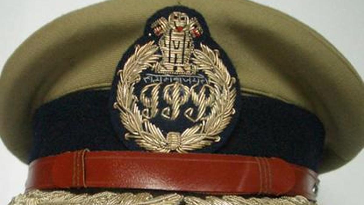 Supreme Court building with Indian Police Service officers standing in front, symbolizing law and order issues.