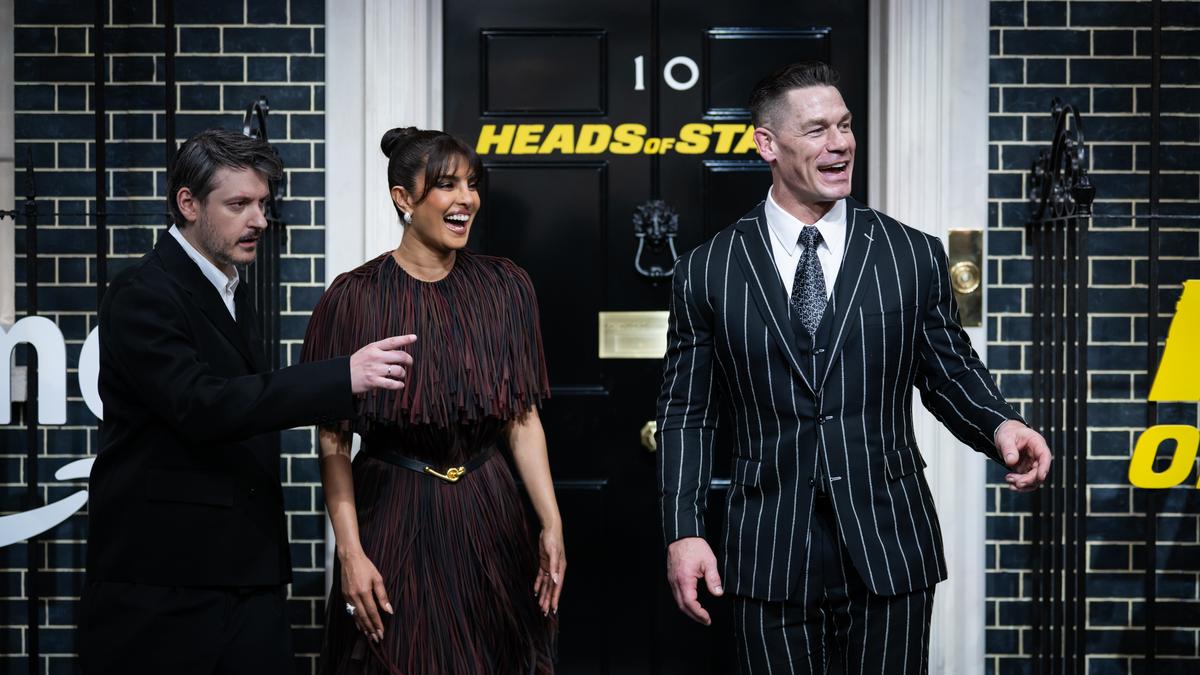 Priyanka Chopra Jonas and John Cena on the set of 'Heads of State'