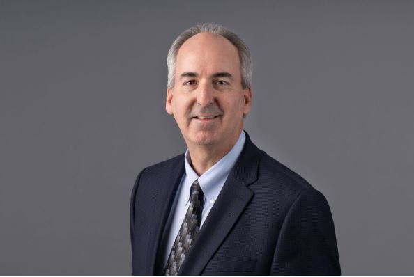 Cryptocurrency researcher analyzing blockchain data on a digital interface