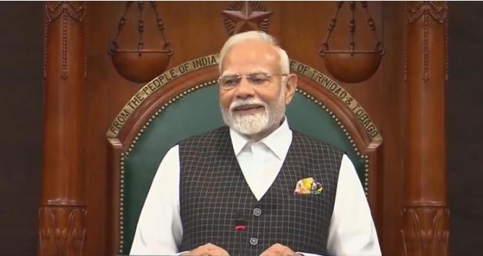 "PM Modi addressing Trinidad and Tobago Parliament with a humorous remark on West Indies cricket"